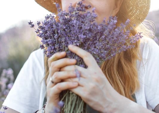 Woman smiling lavender flowers